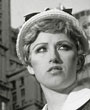 Contemporary Art: detail of a black and white photograph by Cindy Sherman of a young woman in a city