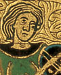 Early Medieval Europe: detail of the decoration of the side of a box, showing the head of a musician in black, green and gold leaf.