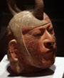 Africa, Ocenia, and the Americas: a jug in the shape of a man's head; Peruvian