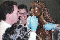 Dan O'Connor has Hope McMath smiling during Art Beyond Vision at the Cummer Museum of Art & Gardens.